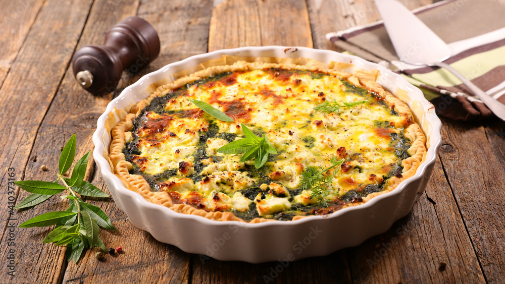 vegetarian quiche on wood background vegetarian quiche on wood background