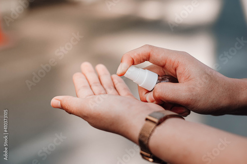 Medical hand sanitizer to prevent corona virus, clean hands to prevent corona virus virus on hands Women wash their hands with an alcohol sanitizer. Hygiene concept Avoid virus infection