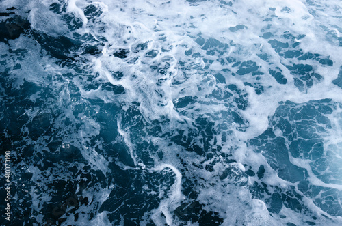Sea water top view. Wave splash background. © Alekss