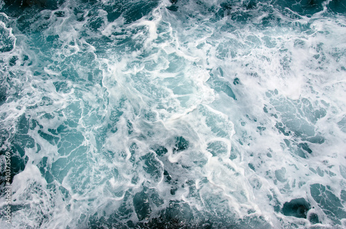 Sea water top view. Wave splash background. © Alekss