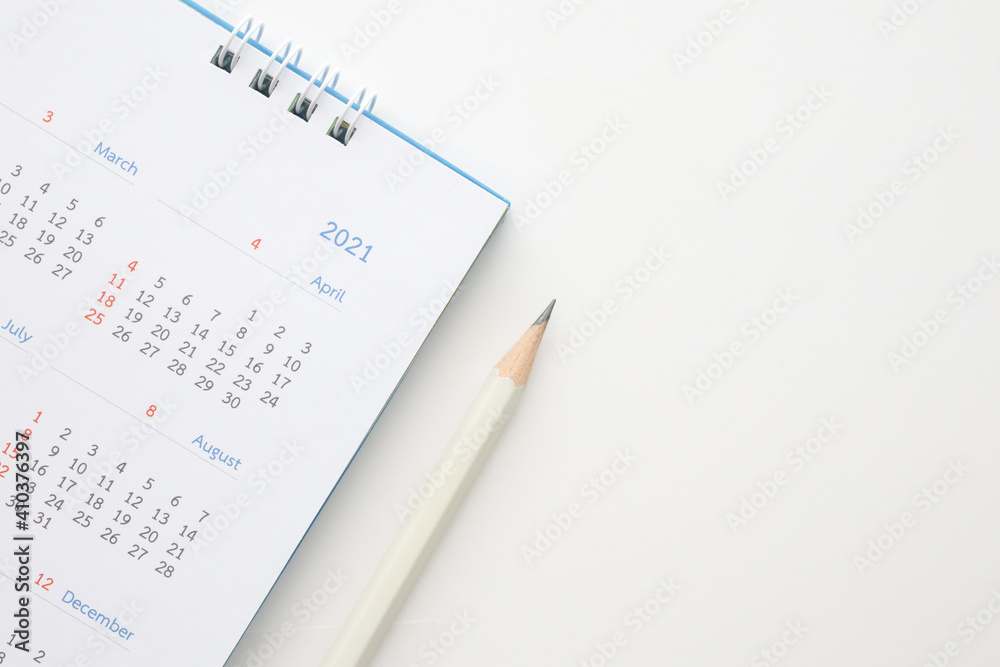 2021 calendar with pencil on white background business planning appointment meeting concept 2021 calendar with pencil on white background business planning appointment meeting concept