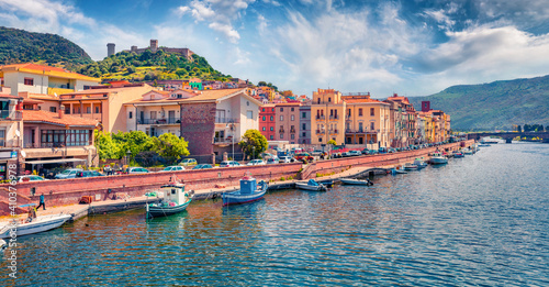 Сharm of the ancient cities of Europe. Colorful summer cityscape of Bosa town with Serravalle casttle on background. Splendid landscape of Temo river. Morning view of Sardinia island, Italy, Europe.
