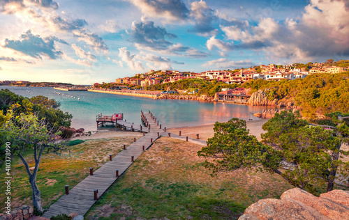Fototapeta Naklejka Na Ścianę i Meble -  Сharm of the ancient cities of Europe. Attractive evening view of Porto Cervo, Province of Olbia-Tempio Italy, Europe. Romantic spring scene of Sardinia. Beautiful Mediterranean seascape.