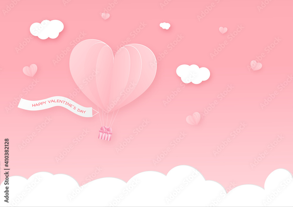 Illustration of heart air ballooon floating over pink sky background and clouds