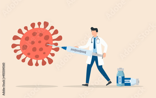 Doctor with Vaccine syringe killing COVID-19 virus, syringe immunization injection for prevention and treatment of coronavirus infection, a doctor holding a large syringe