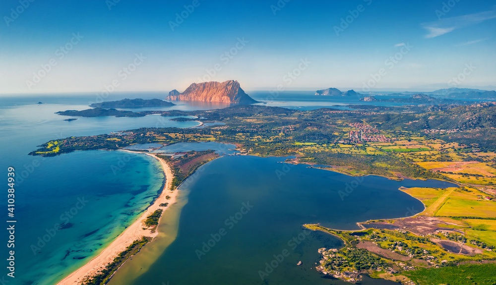 Marvelous spring view from flying drone of La Cinta beach. Spectacular morning scene of Sardinia island, Italy, Europe. Aerial Mediterranean seascape. Beauty of nature concept background.