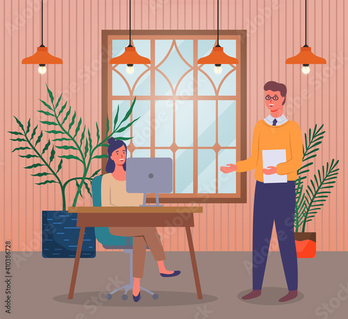 Meeting of colleagues in the office. Woman sitting at a table with computer, man standing holding paper document. Project management and teamwork concept. Businessman brought a report for verification