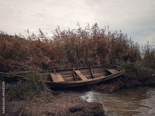 Autumn boat on the shore