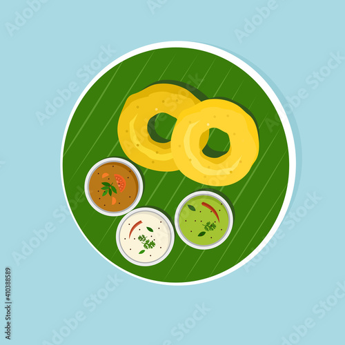 South Indian breakfast dish 'Vada with Sambar and Chutney' on banana leaf 