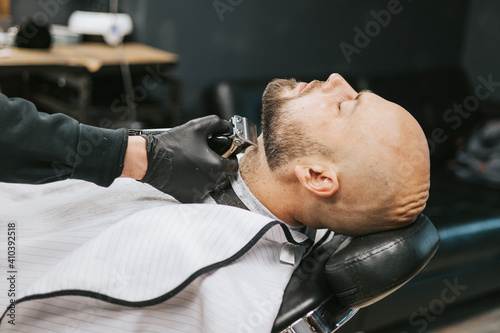 beard modeling in Barber shop, beard care for men, male beauty concept