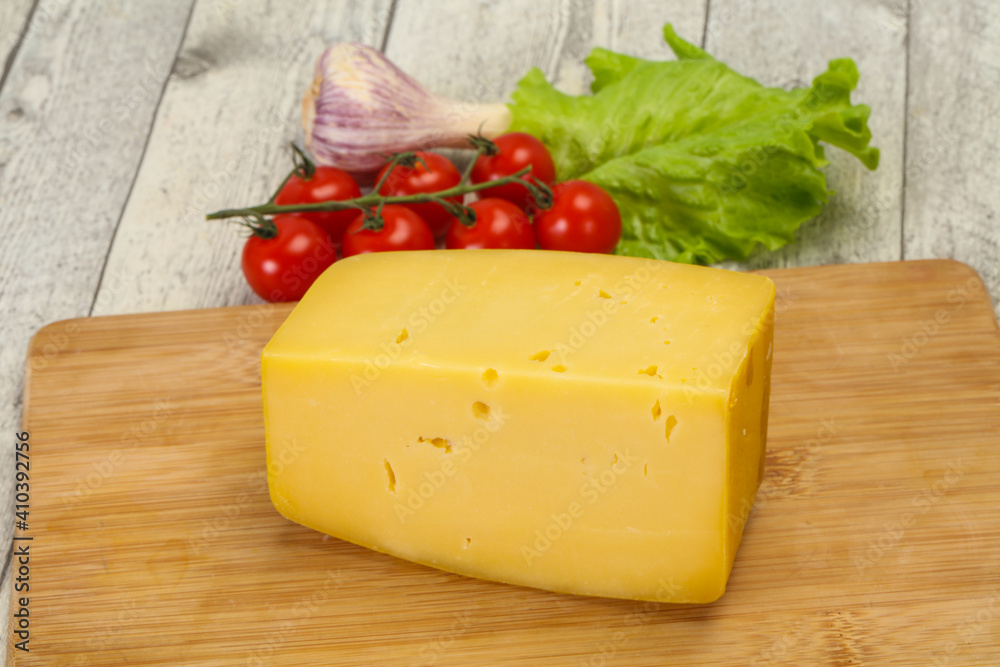 Hard yellow tasty cheese brick Hard yellow tasty cheese brick