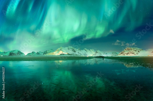 Aurora Borealis lights over Lofoten Islands in Norway © Adrian