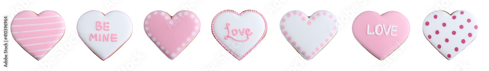 Set with different delicious heart shaped cookies on white background, banner design. Valentine's Day