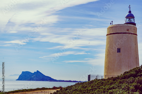 Lighthouse and Gibraltar rock  La Alcaidesa  Spain.