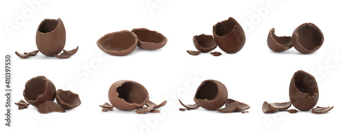 Set with broken chocolate eggs on white background, banner design photo