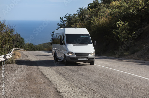 Minibus Moves on the road from the sea