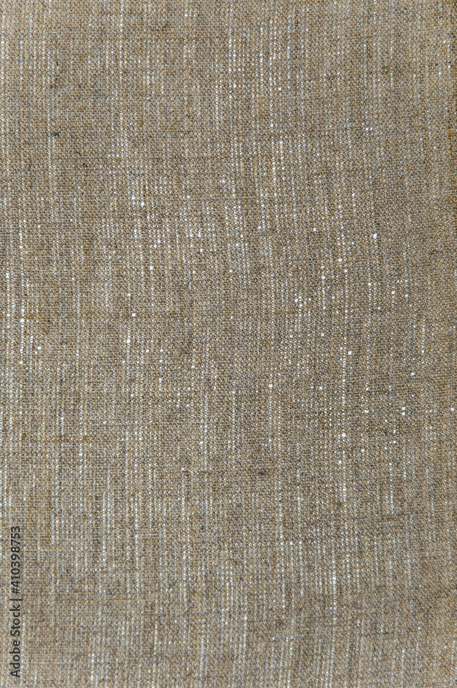Fototapeta premium simple linen background: the reverse side of the primed canvas stretched over the frame, close, toning
