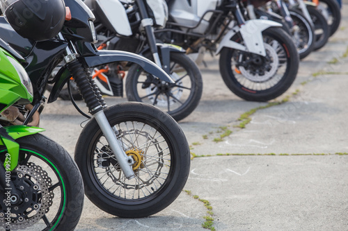 motorcycles on parking on asphalt