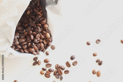 roasted coffee beans in a paper bag