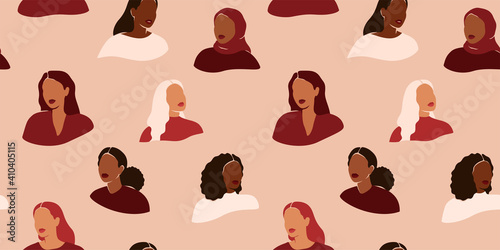 Seamless pattern with female faces in a paper cut style. Repeatable background with women of different cultures and ethnicity. Flat vector illustration