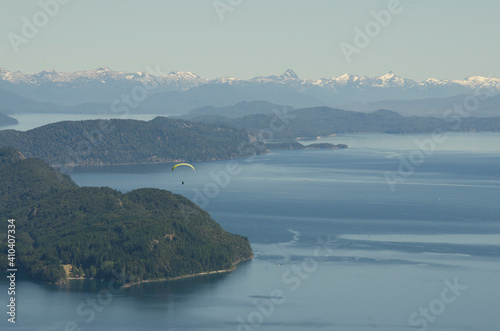 paragliding over bariloche, selective focus