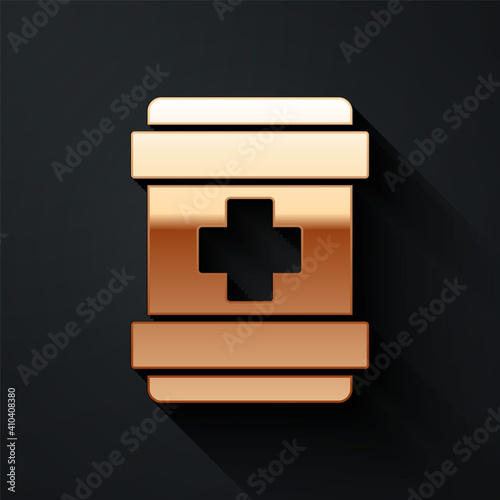 Gold First aid kit icon isolated on black background. Medical box with cross. Medical equipment for emergency. Healthcare concept. Long shadow style. Vector.