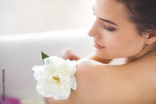 Perfect woman bathing. Female making spa procedure.