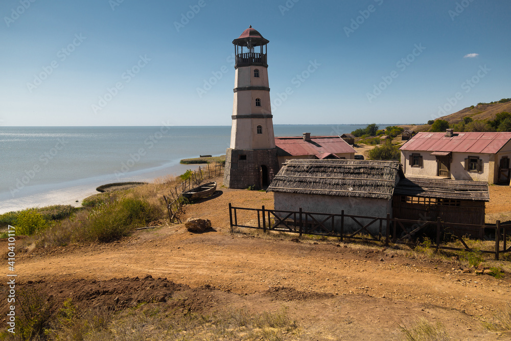 Lighthouse at the beach at the sea