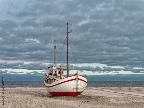 Slettestrand cutter fishing vessel for traditional fishery at the North Sea coast in Denmark photo