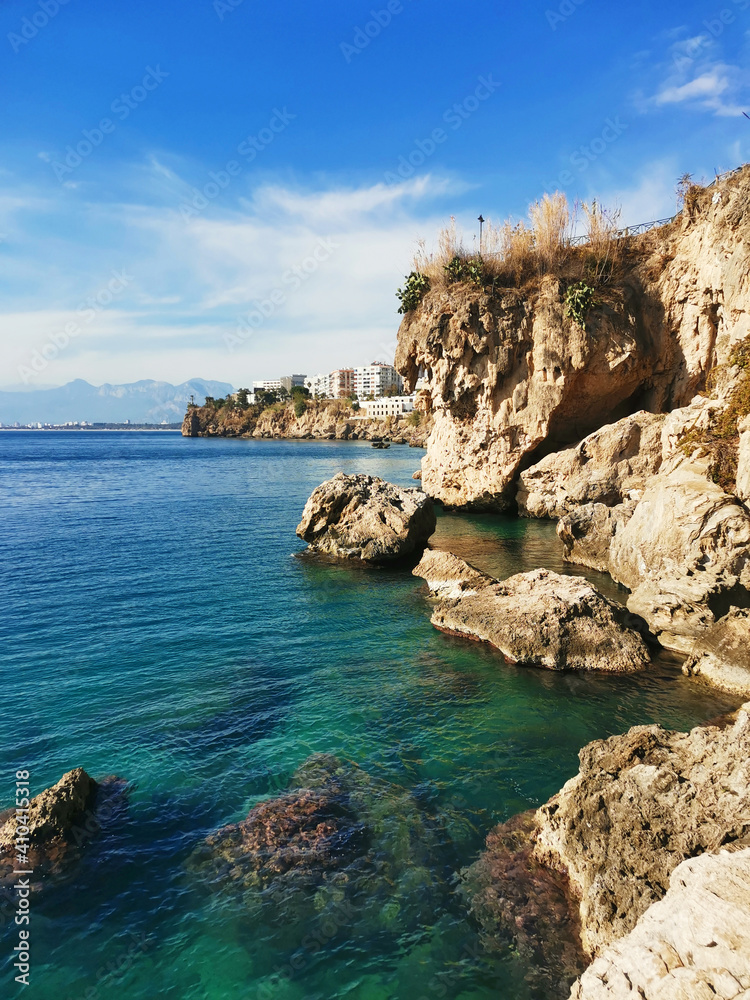 Beautiful views of the Mediterranean Sea and the mountain landscape. Rocky coast and turquoise-blue water.