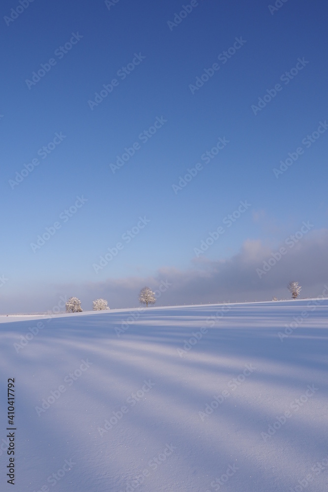 Winter Wonderland with blue sky, clouds and a lot of snow Winter Wonderland with blue sky, clouds and a lot of snow