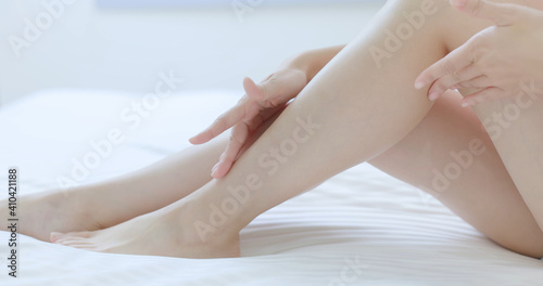 Beauty woman touch her leg © ryanking999