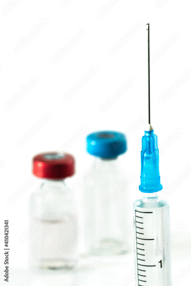 Vaccine vials and syringe Vaccine vials and syringe