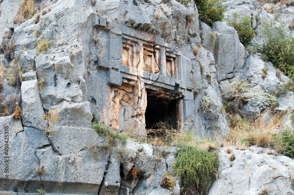 Lycian rock tombs - Lycian Peace in Turkey, the magnificent ruins of the Greco-Roman theater and tombs carved into the rocks