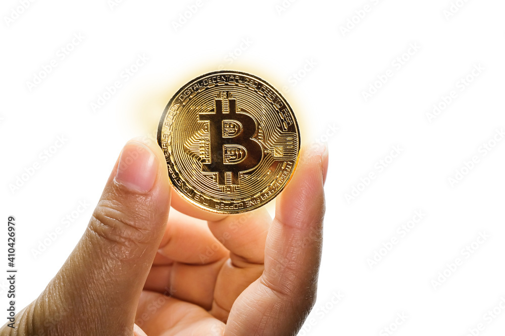 Hand holding Gold bitcoin on white background Hand holding Gold bitcoin on white background