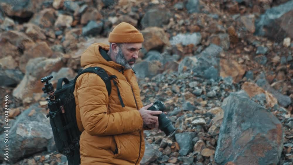 Nature photographer in action in 4k UHD Nature photographer in action in 4k UHD