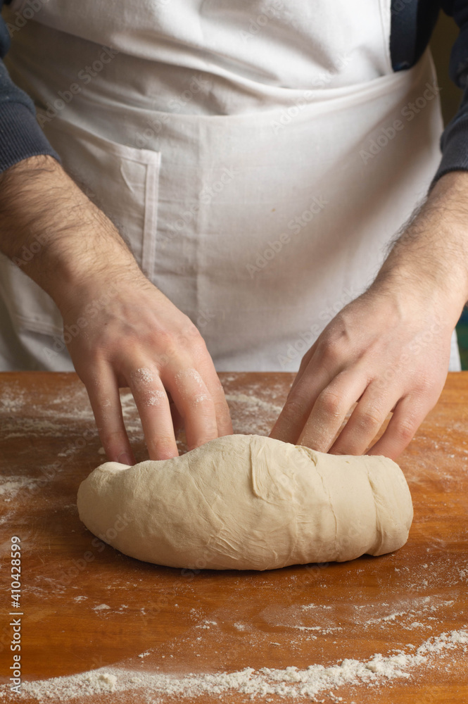 Obraz premium Pizza dough in the making