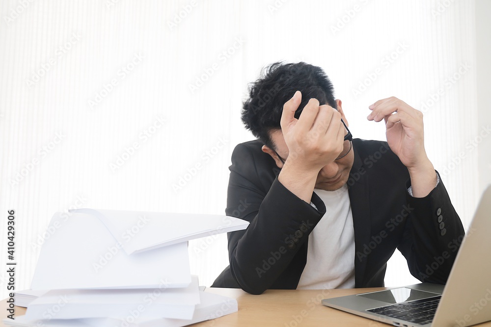 Angered Asian man working in office,He’s looking at laptop and screaming, bad emotional, a lot of work, fighting with college Angered Asian man working in office,He’s looking at laptop and screaming, bad emotional, a lot of work, fighting with college