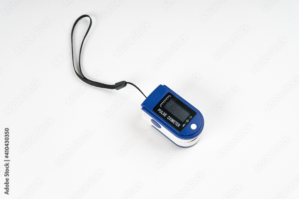 Portable digital fingertip pulse oximeter isolated on white background. Portable digital fingertip pulse oximeter isolated on white background.