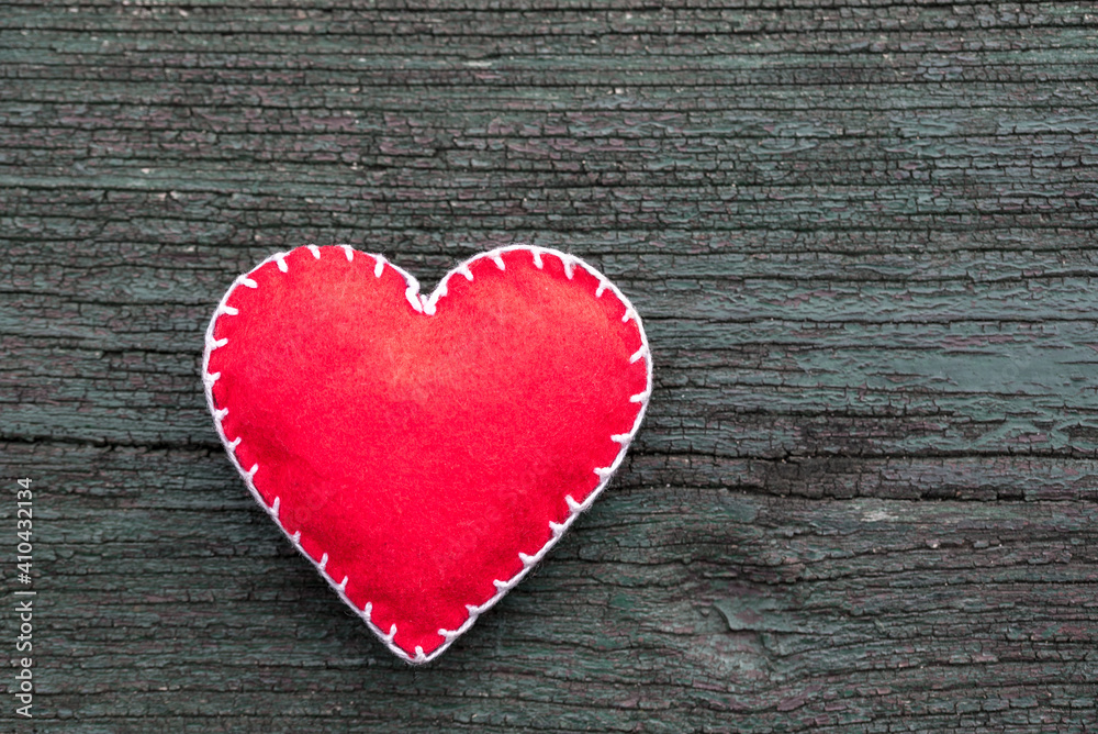 Hand made heart shape, love symbol on wooden background Hand made heart shape, love symbol on wooden background