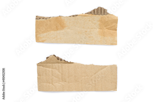 Recycled paper craft stick on a white background. Brown paper torn or ripped pieces of paper isolated on white background.