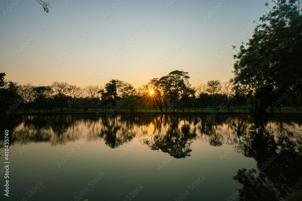 Obraz premium Green park sunset with pond park sky cloud nature landscape