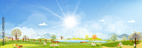 Panorama view of spring village, green meadow on hills, blue sky and sun,Vector cartoon Spring or Summer landscape,Panoramic countryside landscape of farmland with family ducks  swimming on the pond.