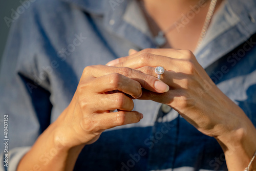 Sad Wife Take off the diamond wedding ring from finger. Quarrel fight of breakup Conflict  bad relationships. Depressed female suffer  Major Depressive Disorder Problem from Dysfunctional Family