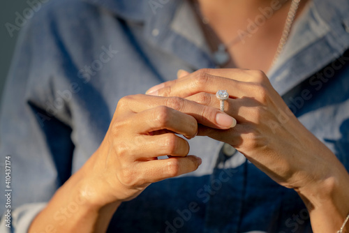 Sad Wife Take off the diamond wedding ring from finger. Quarrel fight of breakup Conflict, bad relationships. Depressed female suffer Major Depressive Disorder Problem from Dysfunctional Family
