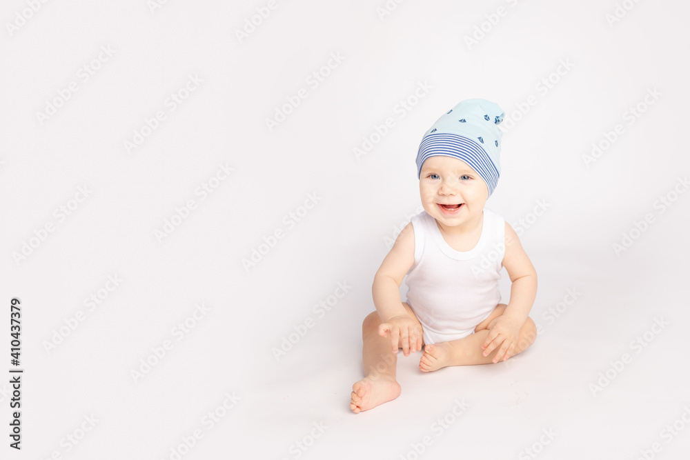 happy little child sitting on white isolated background happy little child sitting on white isolated background