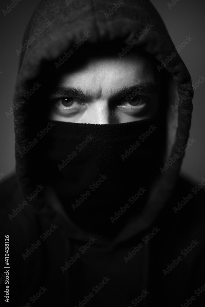Unknown person.Dark figure in a hooded jacket . Incognito Boy. Unknown person.Dark figure in a hooded jacket . Incognito Boy.