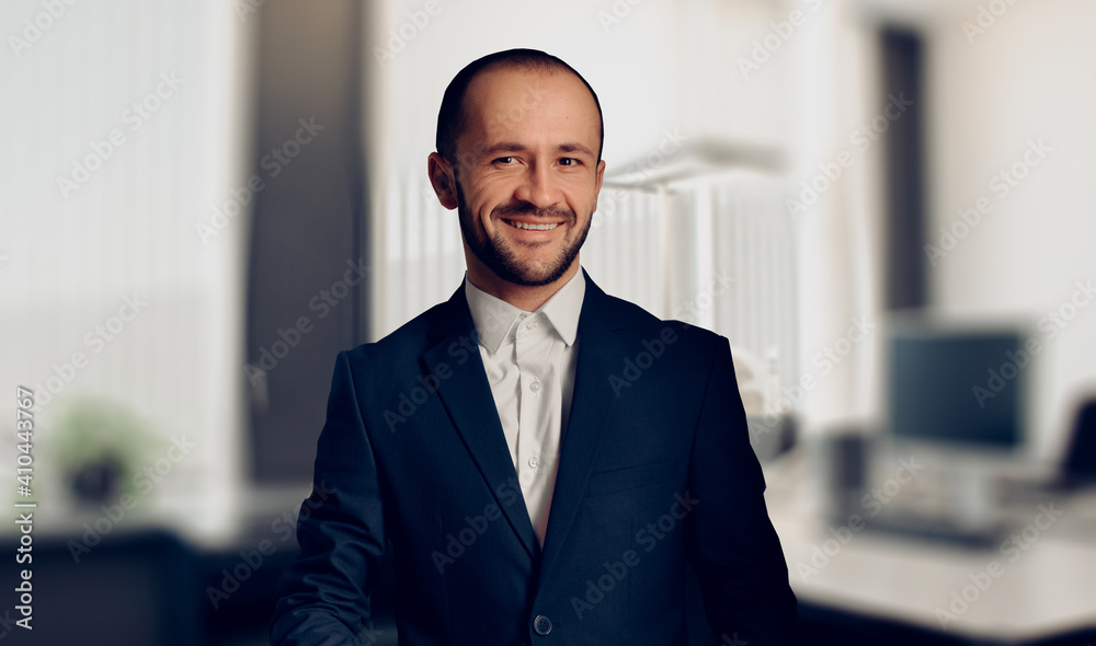 Fototapeta premium Happy smiling young businessman