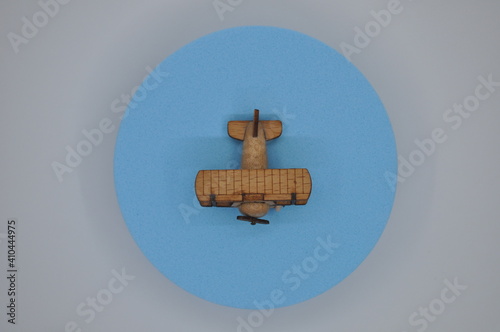 Close up creative shots of small wooden plane models handcrafted from wood, around 3cm X 2cm in size photo