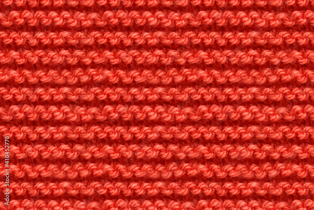 Red Knitwear Fabric Texture. Machine Knitting Texture Macro Snapshot. Knitted Background. Red Knitwear Fabric Texture. Machine Knitting Texture Macro Snapshot. Knitted Background.